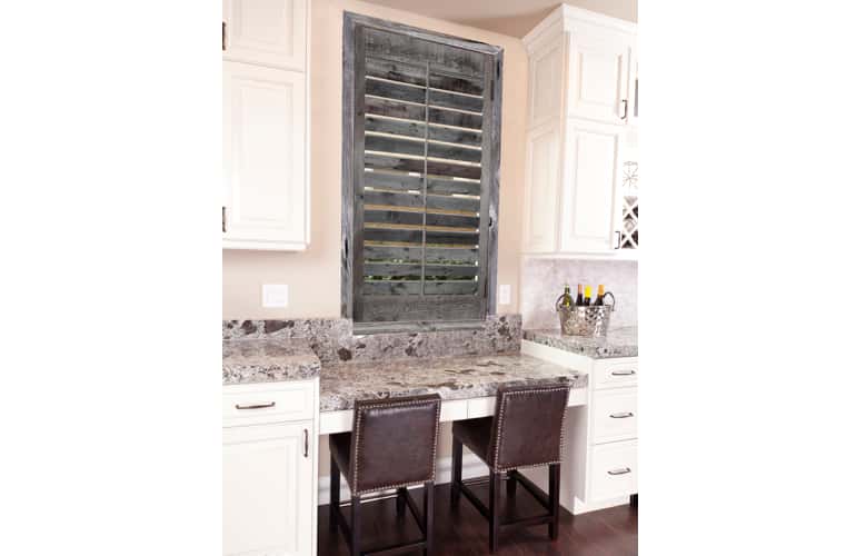 Reclaimed wood shutters on kitchen window in Miami